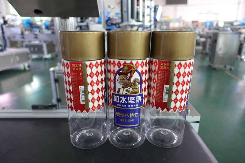 BK-302全自动立式定位坚果罐子圆瓶贴标机